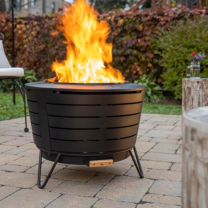 TIKI Patio Fire Pit Bundle – 25-Inch Smokeless Wood Burning Outdoor Fire Pit for Backyard, Patio, Deck & Garden with Removable Ash Pan, Stand & Weather-Resistant Cover – Modern Black Stainless Steel